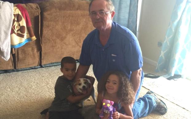 Veteran Bruce, his grandkids and his pup Molly. (Courtesy of Pets for Patriots)
