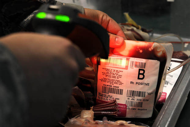 Blood bags are scanned into a computer-based tracking system at the 379th Air Expeditionary Wing’s Blood Transshipment Center in Southwest Asia. (US Air Force photo/Bahja J. Jones)