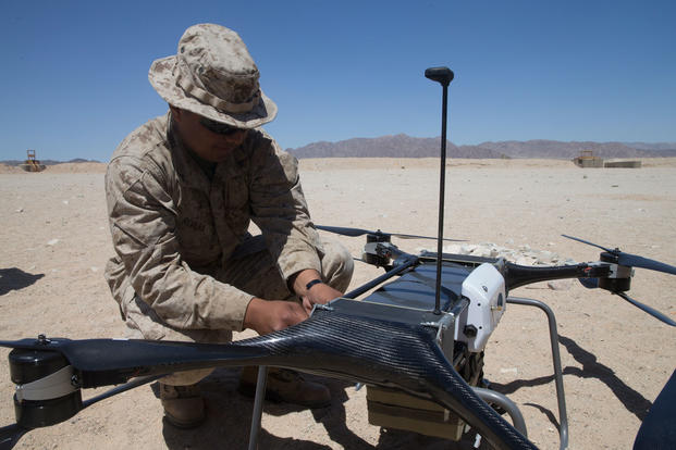 U.S. Marine Corps Lance Cpl. Miguel Rivera, with Combat Logistics Battalion 8, Combat Logistics Regiment 2, 2nd Marine Logistics Group, performs a pre-flight test on the TRV-50 quadcopter during an operations check for Marine Corps Warfighting Laboratory as part of Integrated Training Exercise 3-18 on Marine Corps Air Ground Combat Center, Twentynine Palms, Calif., April 29, 2018. (U.S. Marine Corps photo/Scott Jenkins)