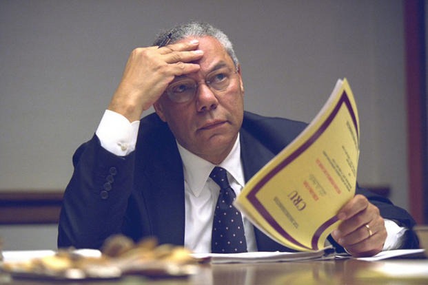 Secretary of State Colin Powell gets briefed inside the President’s Emergency Operations Center, Sept. 11, 2001. (National Archives)