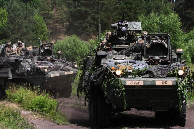 A Stryker from the 2nd Cavalry Regiment fitted with the Common Remotely Operated Weapon Station-Javelin negotiates the terrain of the Hohenfels Training Area, Germany. (U.S. Army photo)