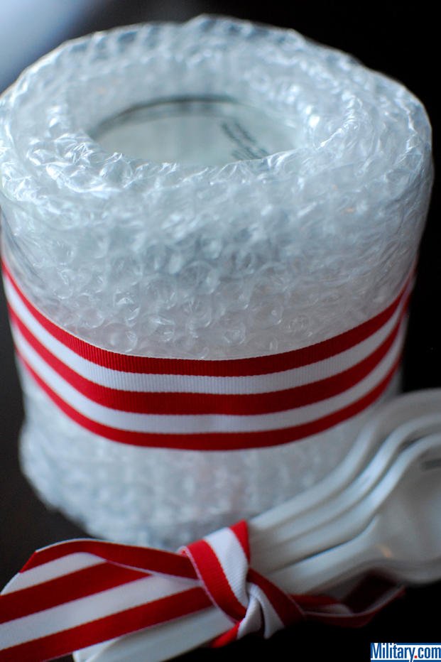 Fancy up your cake in a jar packaging with some ribbon. (Military.com)