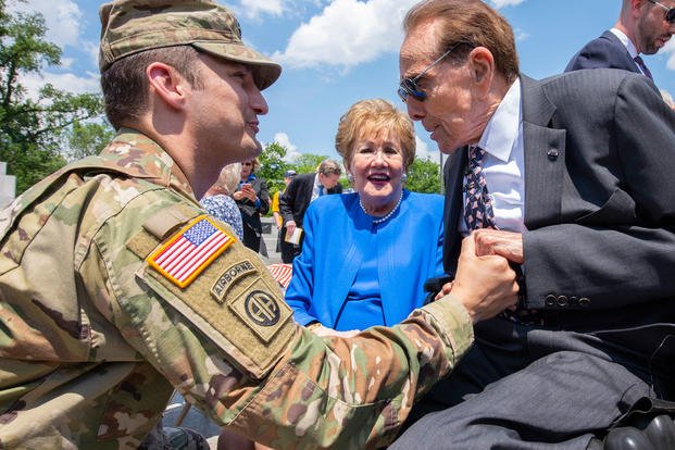 Former Sen. Bob Dole shakes hands with Lt. Col. Michael Lind with the Army’s G-1 office during Dole’s honorary promotion ceremony at the World War II Memorial in Washington, D.C., May 16, 2019. Dole, who was medically discharged as a captain after being severely wounded in WWII, was promoted to colonel. (U.S. Army photo)