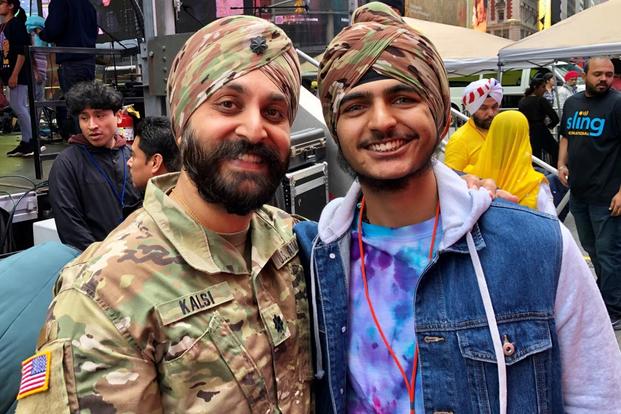 Army Lt. Col. Kamal Kalsi, president of Sikh American Veterans Alliance (SAVA), and Manav Sodhi, a high school student who received a religious accommodation from the Army to wear the Sikh turban and beard. (Photo: Matt Thorn)