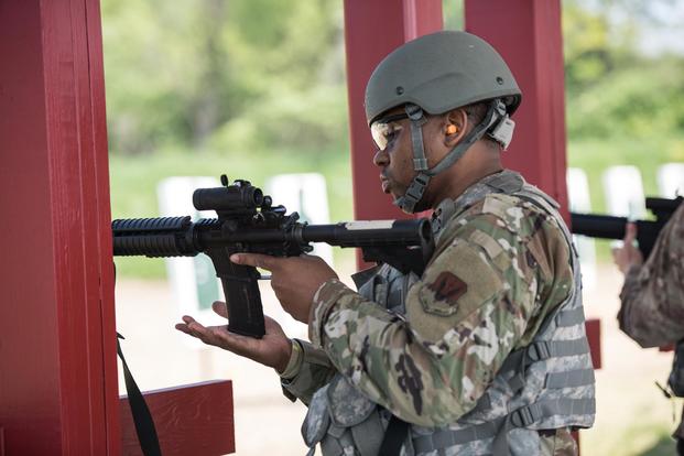 A U.S. Airman from the 193rd Special Operations Wing, Pennsylvania Air National Guard, loads a magazine into his M4 carbine May 8, 2019, in Annville, Pennsylvania. (U.S. Air National Guard/Staff Sgt. Tony Harp)