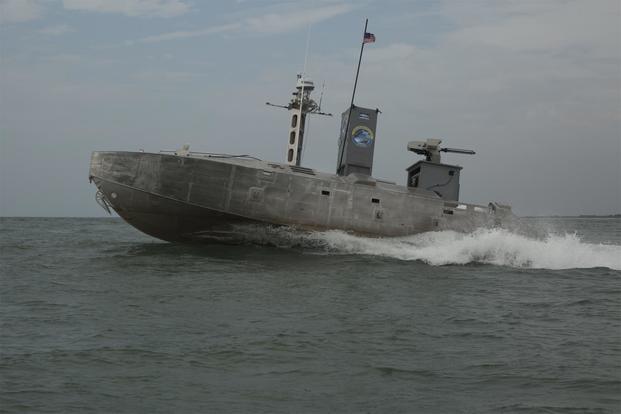 An Expeditionary Warfare Unmanned Surface Vessel autonomously navigates a predetermined course through the water during Advanced Naval Technology Exercise 2019 at Camp Lejeune, N.C. July 12, 2019. (U.S. Marine Corps/Lance Cpl. Nicholas Guevara)