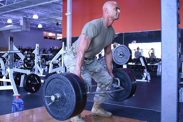 An Army staff sergeant performs a deadlift at OneLife Fitness in Frederick, Maryland.