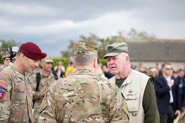 Gen. Milley and Lt. Gen. Donahue speak with veterans at the 78th D-Day Anniversary