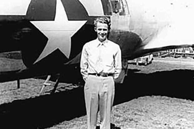Art Lacey stands in front of his hard-won prize: a real B-17 Flying Fortress.