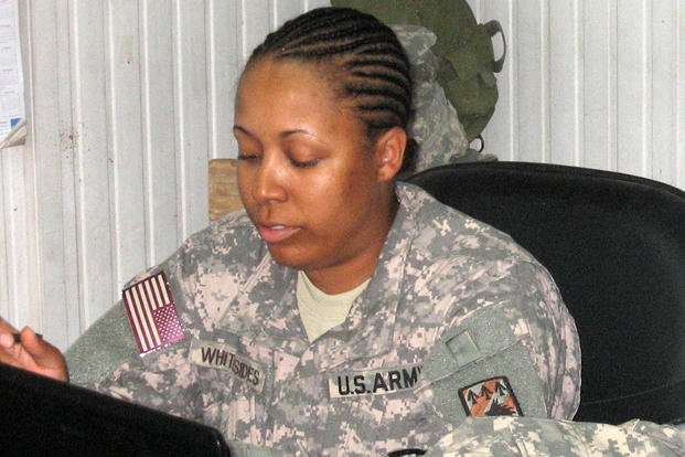Sgt. Lakeisha Whitesides searches internet job hunting sites in Iraq before redeployment. 