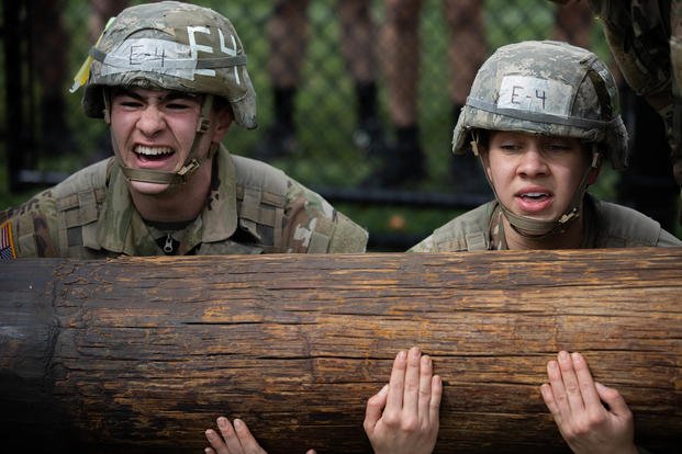 Cadets from the U.S. Military Academy lift a log during the Sandhurst Military Skills Competition at West Point, N.Y.