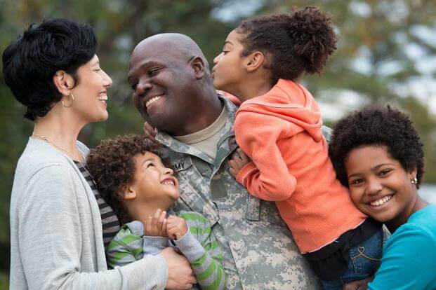 serviceman with family