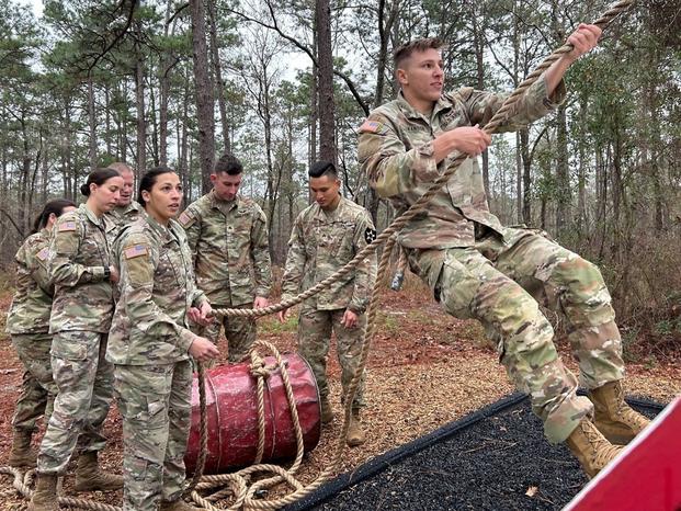 U.S. Army Soldiers attending Class 23-001 of the U.S. Army Aviation Center of Excellence Noncommissioned Officer Academy - Fort Rucker complete a scenario-driven and mission-oriented situational training exercise to test their physical and mental agility on Dec. 14, 2022. (Photo by Staff Sgt. Jeeney Sigrah-Ennis) U.S. Army Soldiers attending Class 23-001 of the U.S. Army Aviation Center of Excellence Noncommissioned Officer Academy - Fort Rucker complete a scenario-driven and mission-oriented situational training exercise to test their physical and mental agility on Dec. 14, 2022. (Photo by Staff Sgt. Jeeney Sigrah-Ennis)