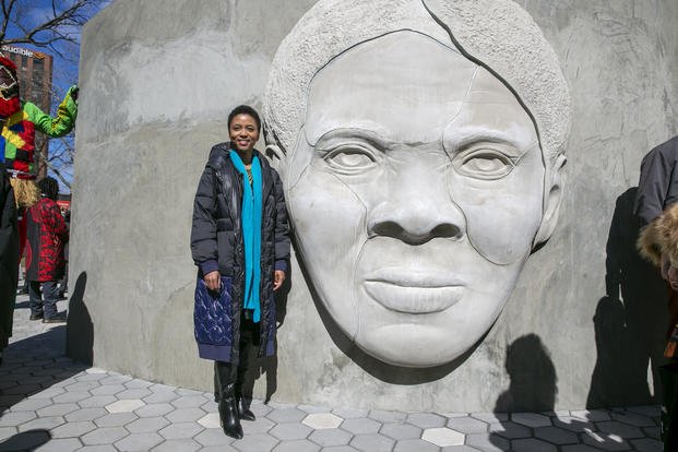 Architect Nina Cooke John stands with the Harriet Tubman monument she designed titled 'Shadow of a Face' in Newark, New Jersey, on Thursday, March 9, 2023. (Ted Shaffrey/AP Photo) Architect Nina Cooke John stands with the Harriet Tubman monument she designed titled 'Shadow of a Face' in Newark, New Jersey.