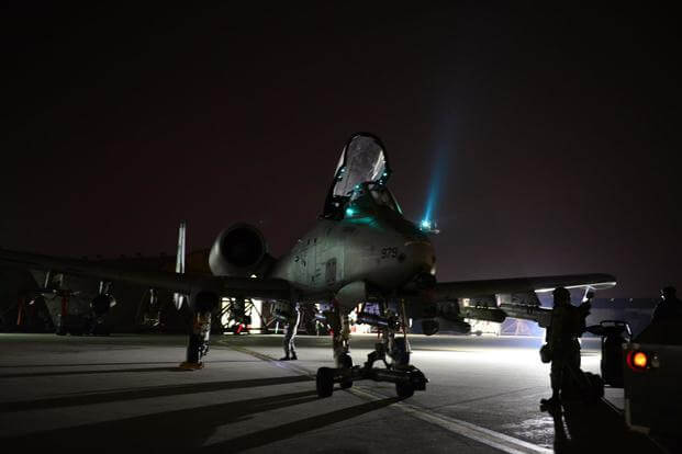 Members of the 25th Fighter Squadron ready A-10 Thunderbolt IIs for night operations during the first night of the exercise Vigilant Ace 16 at Osan Air Base, Republic of Korea, Nov. 2, 2015. (U.S. Air Force photo by Amber Grimm)