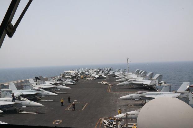 Military.com spent time aboard the USS George H. W. Bush aircraft carrier to observe its operations while underway May 3-4, 2017, in the Persian Gulf. (Photos by Hope Hodge Seck/Military.com)