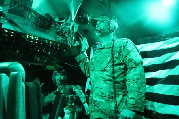 Sgt Justin, with the 156th Airlift Squadron, reenlists in a C-130 over Iraq. (Photo: Oriana Pawlyk/Military.com)