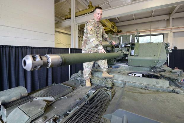 Sgt. 1st Class Nicholas Young, senior NCO of the Army’s Stryker combat vehicle program, discusses the 30mm cannon on the Infantry Carrier Vehicle-Dragoon vehicle at Aberdeen Proving Ground, Md., Aug. 16, 2017. (Photo Credit: Sean Kimmons)