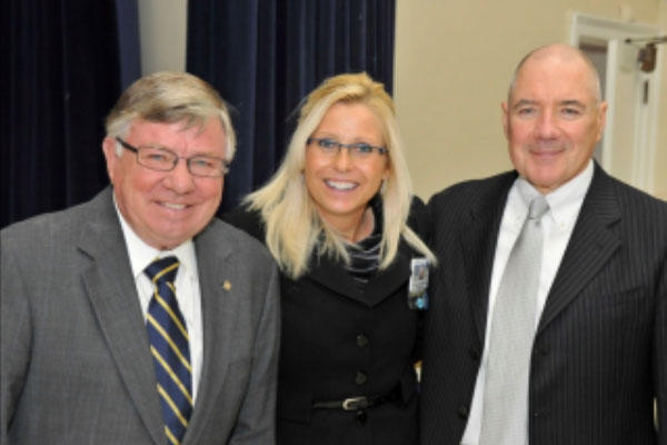 Sharon Helman, who was recently fired as director of the VA hospital in Phoenix, stands with her onetime boss, Max Lewis (right), and another former VA official, Nathan Geraths (left) in this 2011 agency photo.
