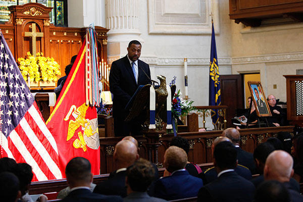 Frank E. Petersen III speaks about his father during a memorial service at the U.S. Naval Academy in Annapolis, Md. (U.S. Marines/Sgt. Terry Brady)