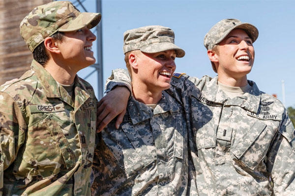 Maj. Lisa Jaster, center, became the third woman to graduate from the U.S. Army's Ranger School, Oct. 16, 2015, in Fort Benning, Ga. She joins just two other women, Capt. Kristen Griest, left, and 1st Lt. Shaye Haver, right. (U.S. ARMY RESERVE COMMAND)