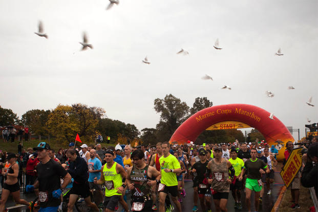 More than 30, 000 men and women from all over the world start the 40th Marine Corps Marathon in Arlington, Virginia, Oct. 25. (Photo By: Sgt. Justin M. Boling)