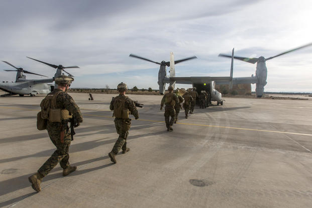 U.S. Marines with Special-Purpose Marine Air-Ground Task Force Crisis Response-Africa load up an MV-22B Osprey during a tactical recovery of aircraft and personnel exercise, Dec. 7, 2015, at Los Llanos Air Base, Spain. Photo: Staff Sgt. Vitaliy Rusavskiy