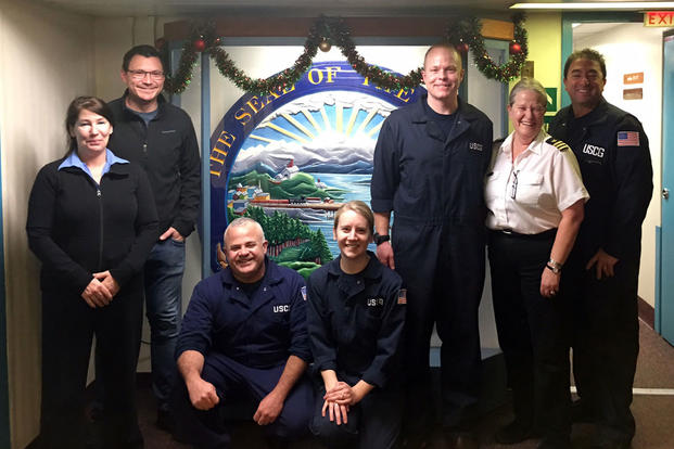 Lt. Ryan Butler, Lt. j.g. Katharine Martorelli, Chief Warrant Officer Israel Nieves and Chief Warrant Officer Martin Donohue from Sector Juneau, Alaska, along with vessel Master Captain Josh McGrath and two other crewmembers. (U.S. Coast Guard photo)