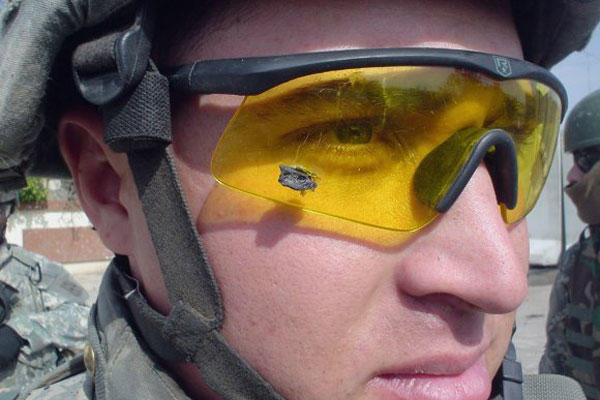 In this Feb. 6, 2006 file photo, 1st Lt. Anthony Aguilar wears the ballistic protective eyewear that prevented a bomb fragment from possibly damaging his eyes when an improvised explosive device detonated near his Stryker vehicle in Iraq. U.S. Army photo
