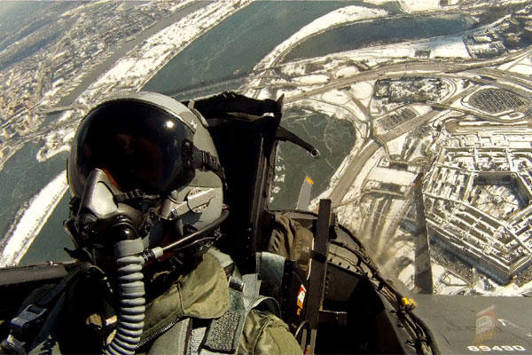 Caption: Capt. Philip Gunn performs a flyover of the Pentagon. (Air Force photo)
