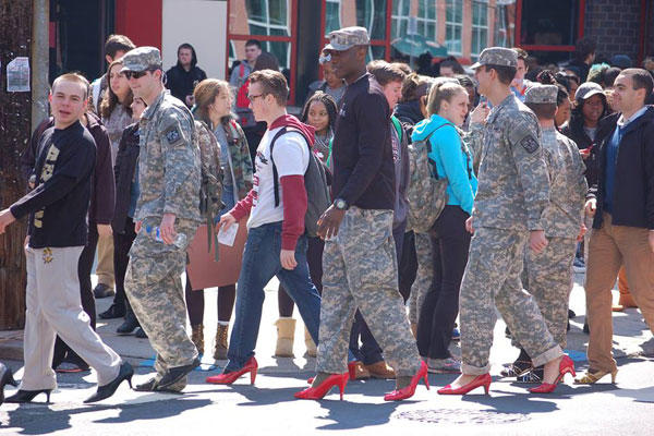 Captions: Cadets wear red heels in support of an event for sexual assault awareness called Walk a Mile in Her Shoes. (Source: Temple ROTC Facebook page)