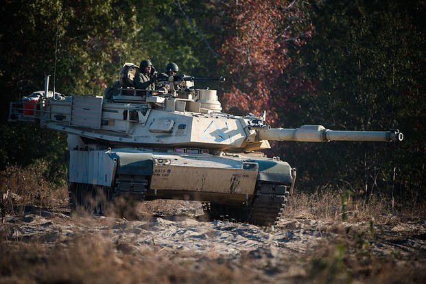 Students from the Armor Basic Leader Course at Fort Benning, Georgia, train during a combined competitive maneuver exercise at Benning’s Good Hope Training Area on Nov. 16, 2016. U.S. Army photo