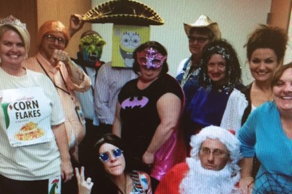 Brandon Coleman, a former Marine and an addictions specialist at the Phoenix VA hospital, says this Halloween photo shows that supervisors let one of his colleagues, Jeremy Pottle (second from left), mock him by dressing as him in custome.