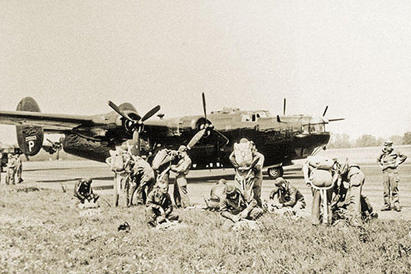 Jedburgh teams suit up in England prior to boarding a ‘Carpetbagger’ B-24 Liberator drop aircraft, August 1944. (U.S. Army photo)