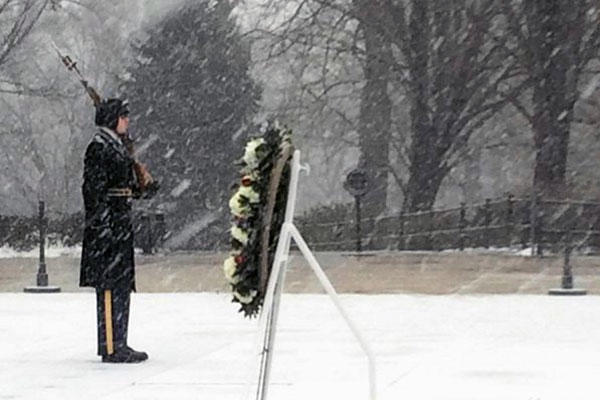 An honor guard watches over the Tomb of the Unknowns at Arlington National Cemetery during Winter Storm Jonas on Jan. 23. By noon of that day, the National Guard had more than 2,000 troops helping 12 states cope with the snow emergency. (Army photo)