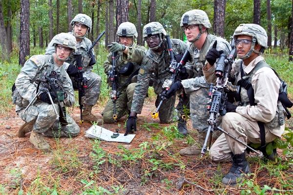 A soldier from Yemen (far right) and another from Greece (third from left) train alongside U.S. nfantry officer students on a dismounted patrol on Oct. 3, 2012, at Fort Eustis, Virginia. (Photo by Patrick A. Albright/U.S. Army)