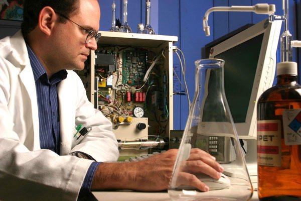 Scientist using a computer.