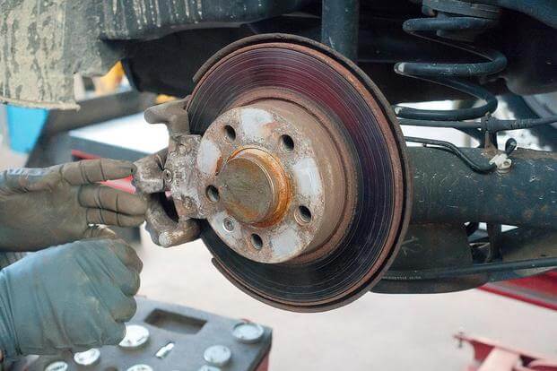 car disc brake repair (Public domain photo)