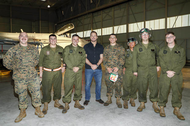 SAN DIEGO, CA - DECEMBER 12: Actor Chris Pratt (C) poses with U.S. Marines at Marine Corps Air Station Miramar on December 12, 2016 in San Diego, California. (Photo by Rich Polk/Getty Images for Sony Pictures Entertainment )