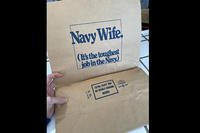 In the 1980s, Navy commissaries printed &quot;Navy Wife. It's the Toughest Job in the Navy&quot; on grocery bags.