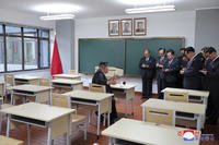 North Korean leader Kim Jong Un inspects a classroom of a newly built central cadres training school