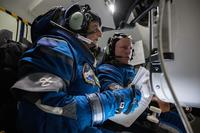 Boeing Crew Flight Test crew members Barry E. “Butch” Wilmore and Sunita L. “Suni” Williams are pictured in the Boeing Starliner simulator at NASA’s Johnson Space Center.