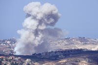 Smoke rises from Israeli airstrikes on villages in the Nabatiyeh district, seen from the southern town of Marjayoun, Lebanon