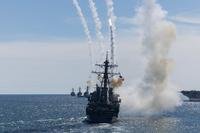 Arleigh Burke-class destroyers fire Standard Missile-2 interceptors during an October 2025 demonstration. The Navy has expended thousands of these multimillion-dollar missiles in Red Sea operations; depleting stockpiles faster than defense contractors can replenish them. (U.S. Navy photo by Mass Communication Specialist Seaman Kaitlyn Bailey)