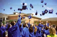 Graduation Caps in Air