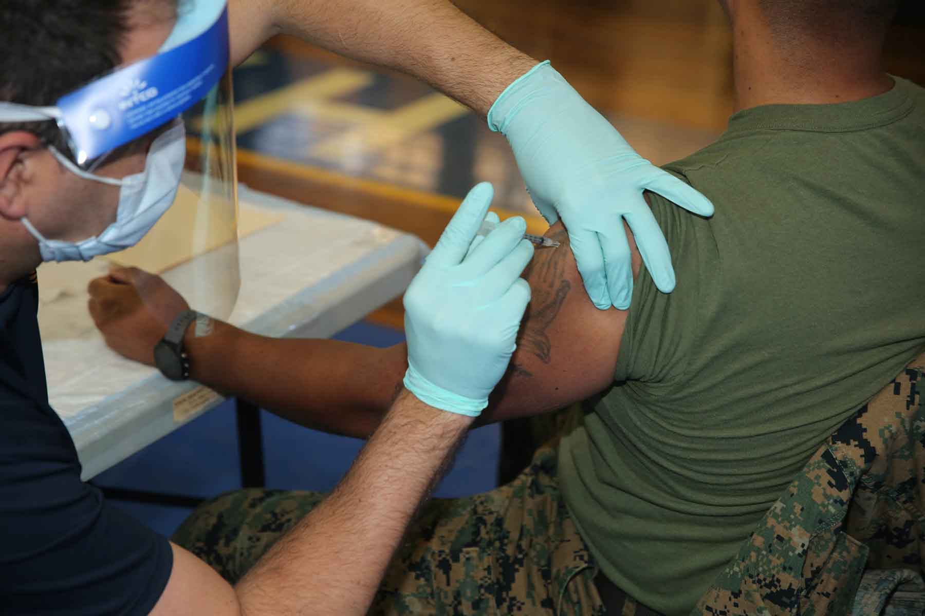 mil marine receives vaccine dose 1800