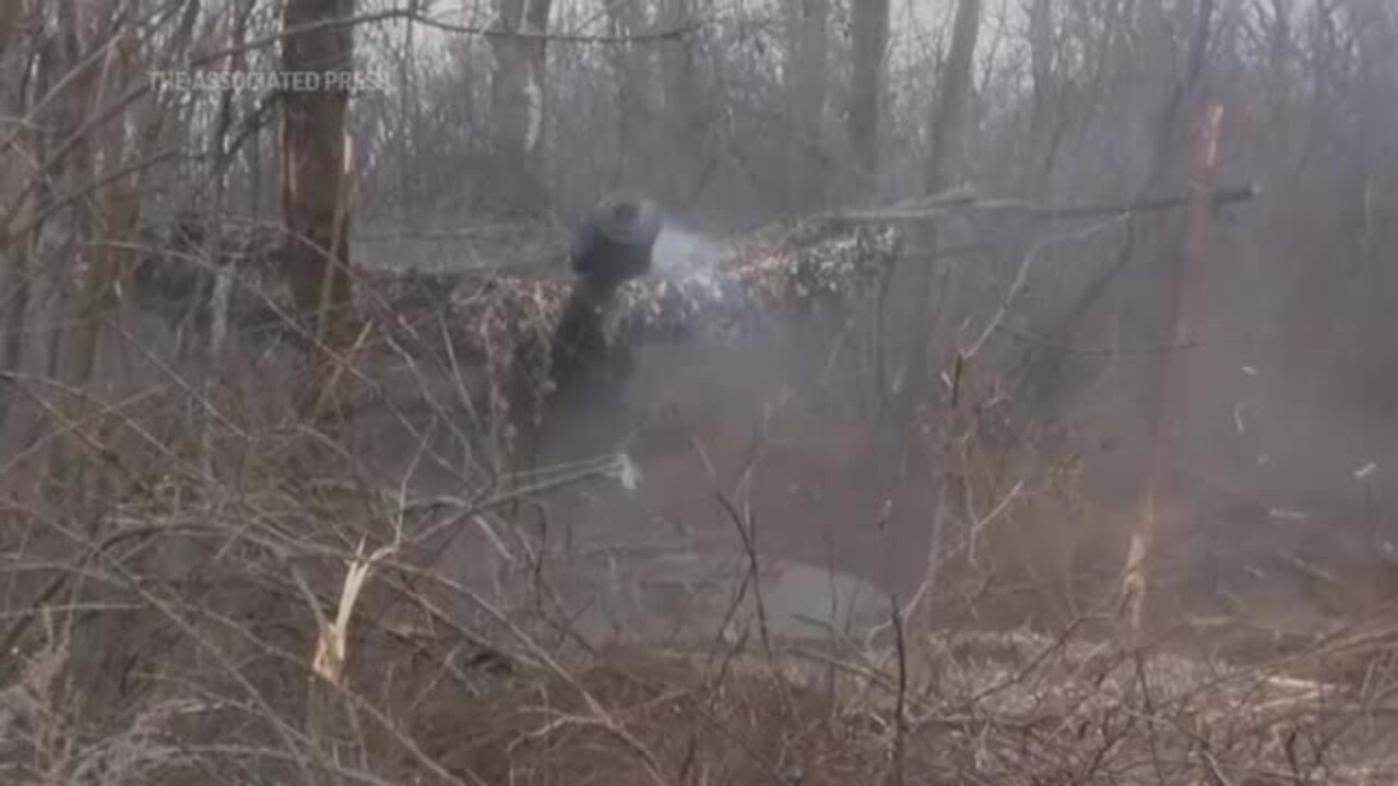 Ukrainian Artillery Unit Fires Howitzers at Russian Infantry Positions in Bakhmut Area