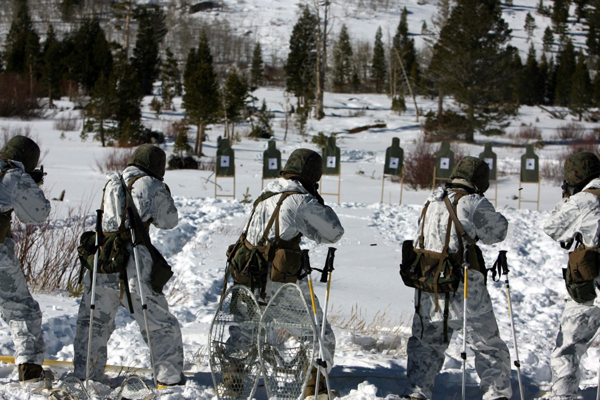 The all white uniforms in the snow 