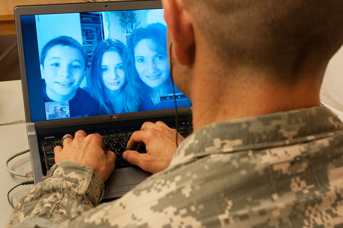 Deployed Soldier Video Chats with Family Back Home