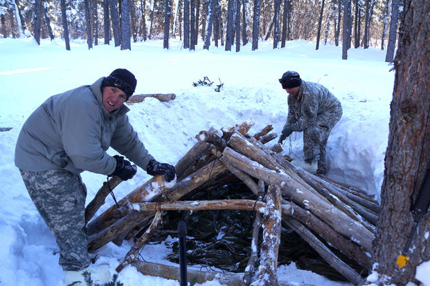 Army soldiers build a shelter at the Northern Warfare Training Center in Alaska. Marines may start training there, too. (DoD photo/Michael O'Brien)
